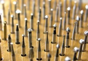 Burs: Variety of shapes and sizes used in notching a crown before we can set a stone.